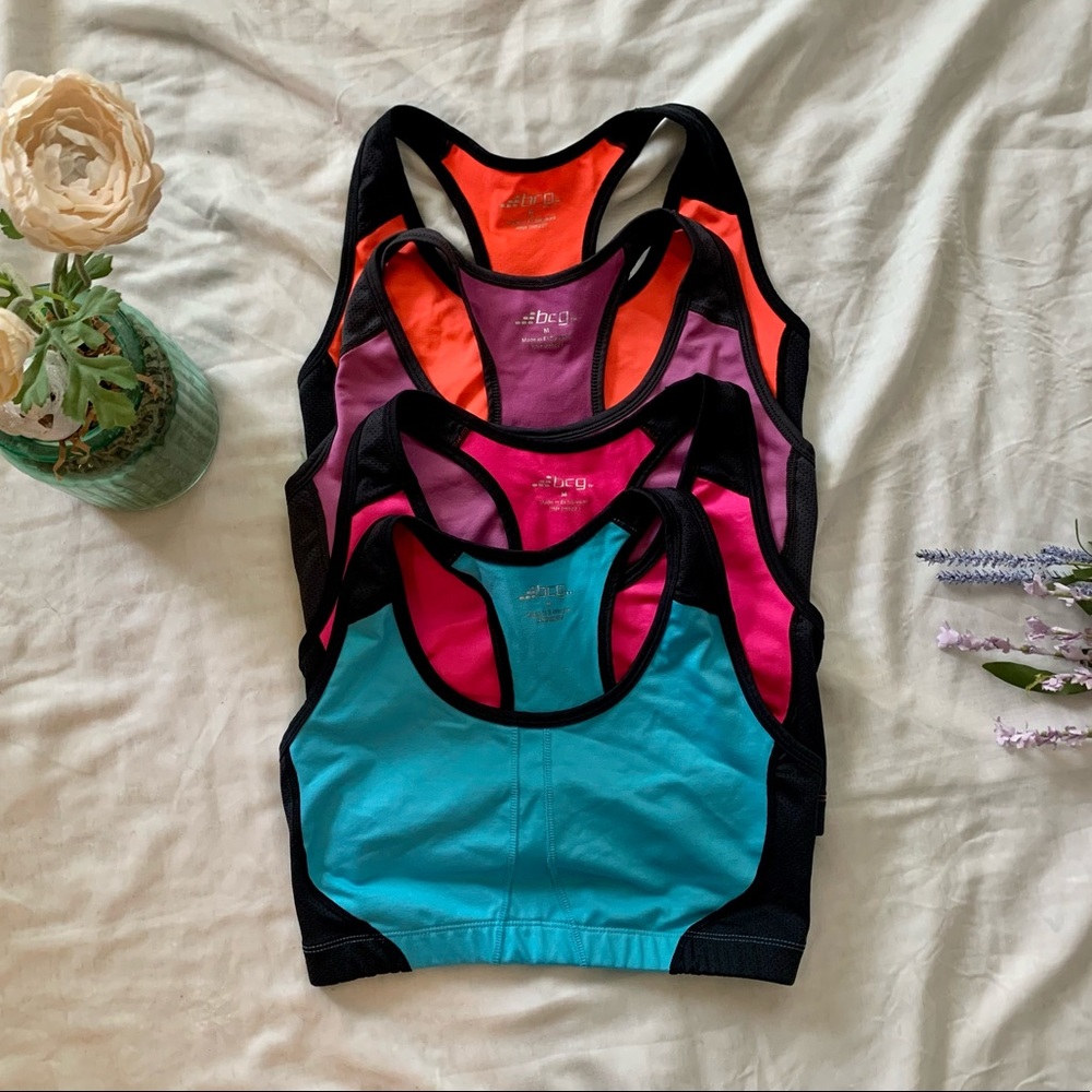 SOLD ! Bright and colorful workout bras! Size M